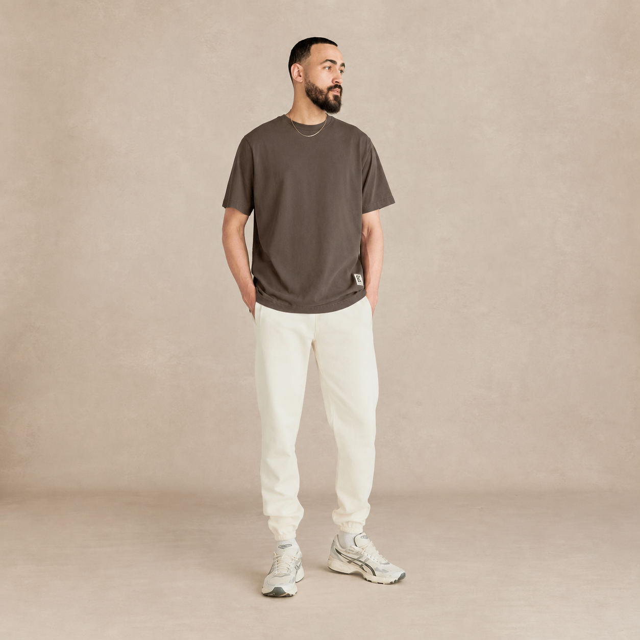 Model wearing Elkep Chocolate Heavyweight Tee side view